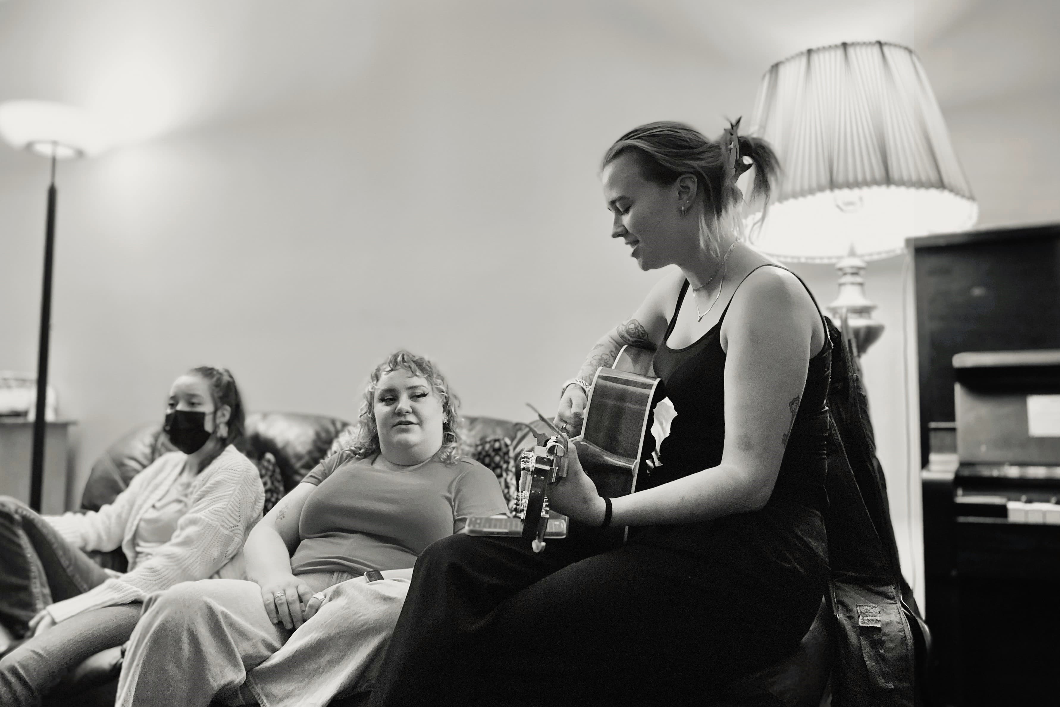 A Song Leader with a Guitar